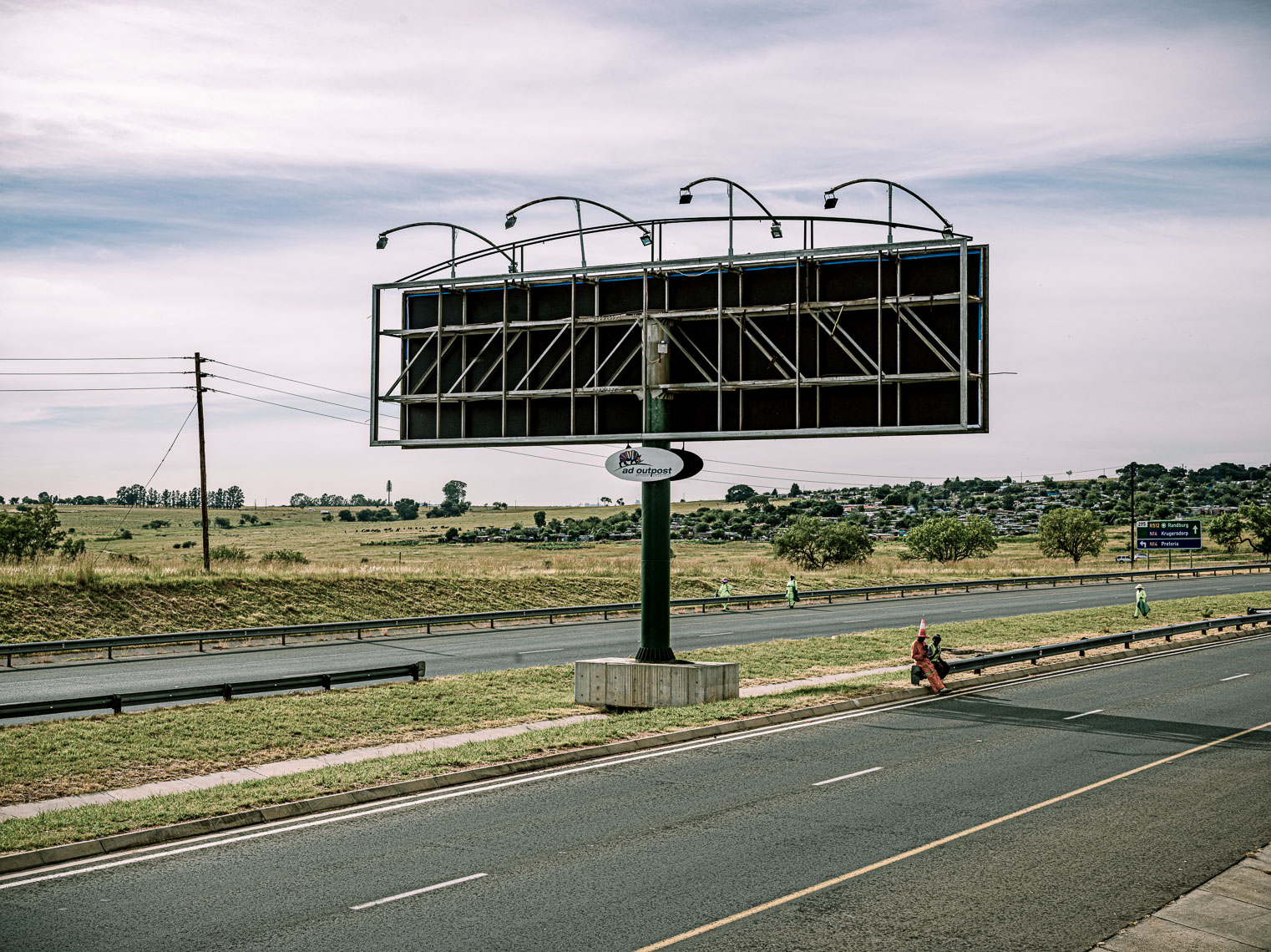Empty billboard on a dual motorway. 