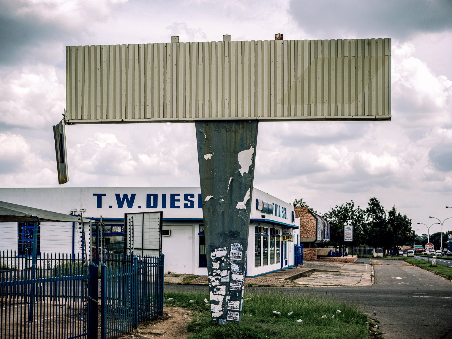 Big empty concrete billboard in an urban industrial location. 